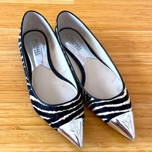 Michael Kors zebra style flats .